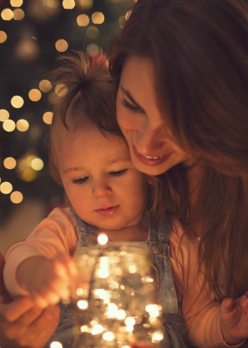 Family and Christmas lights